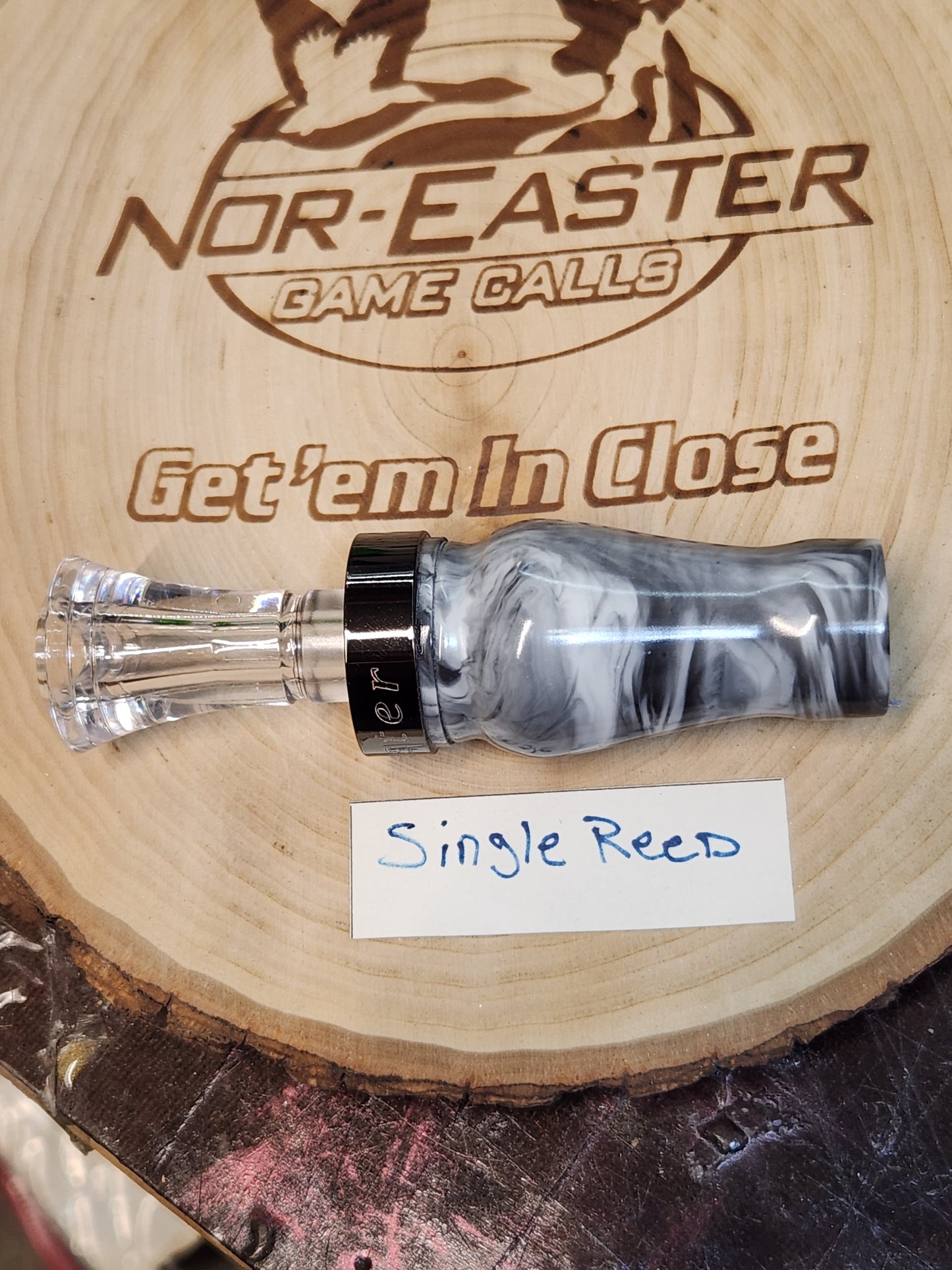 White and black acrylic single reed duck call