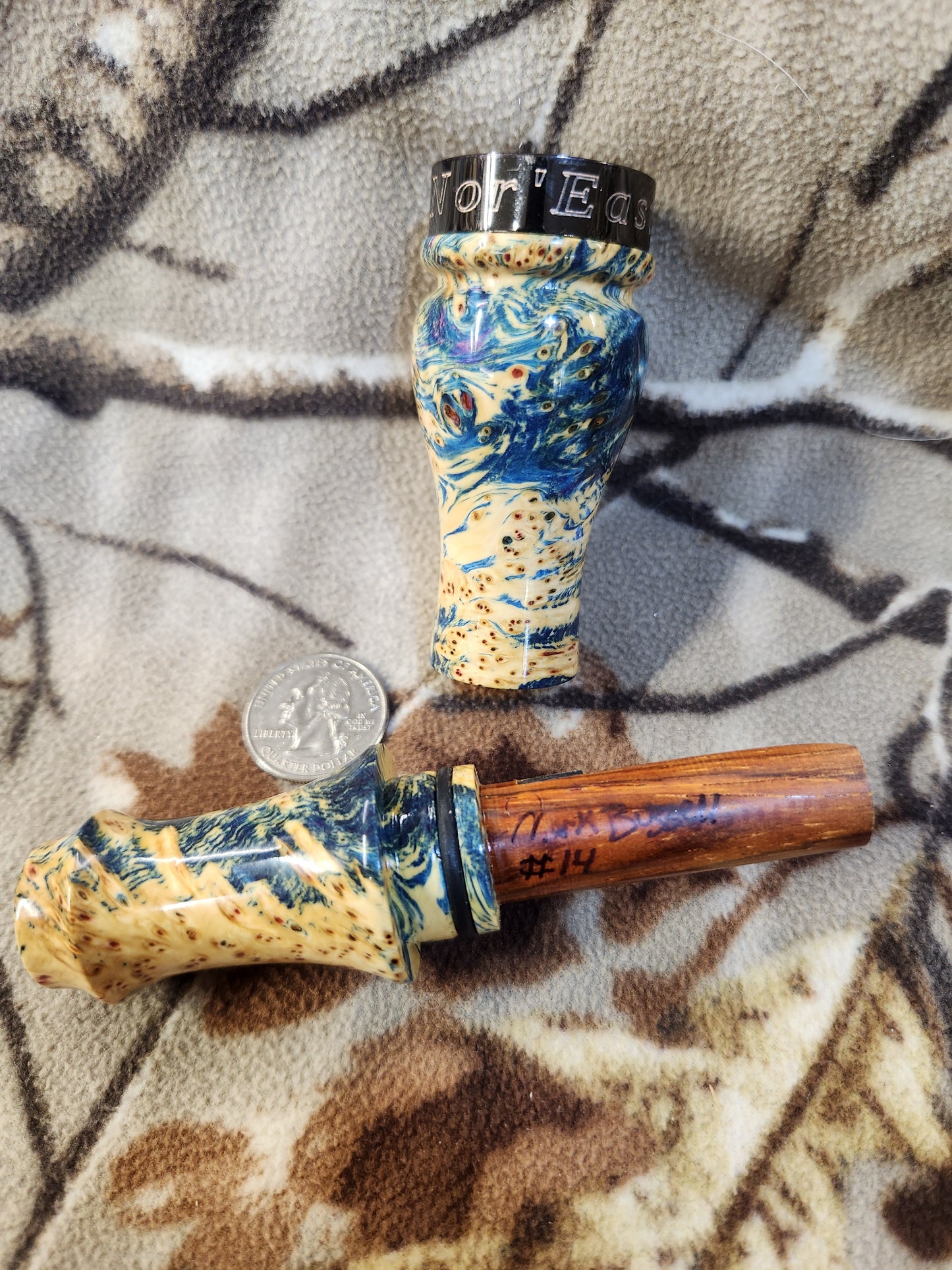 Double reed duck call made from stabilized and dyed yellow cedar burl wood and cocobolo tone board