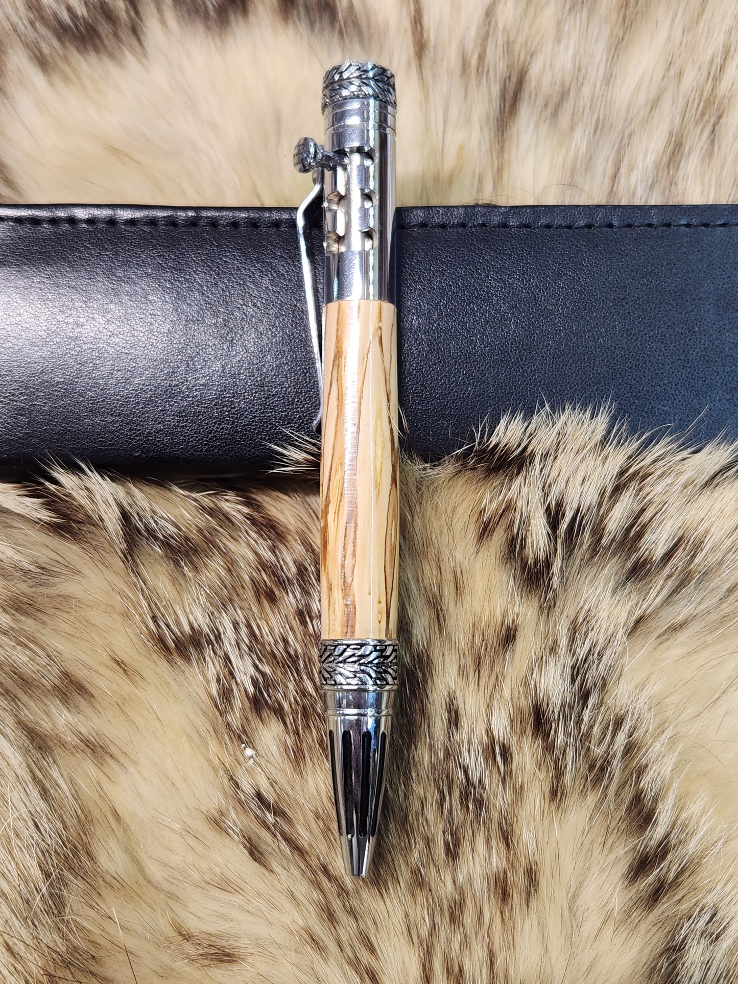 silver gear shift pen made from apple wood