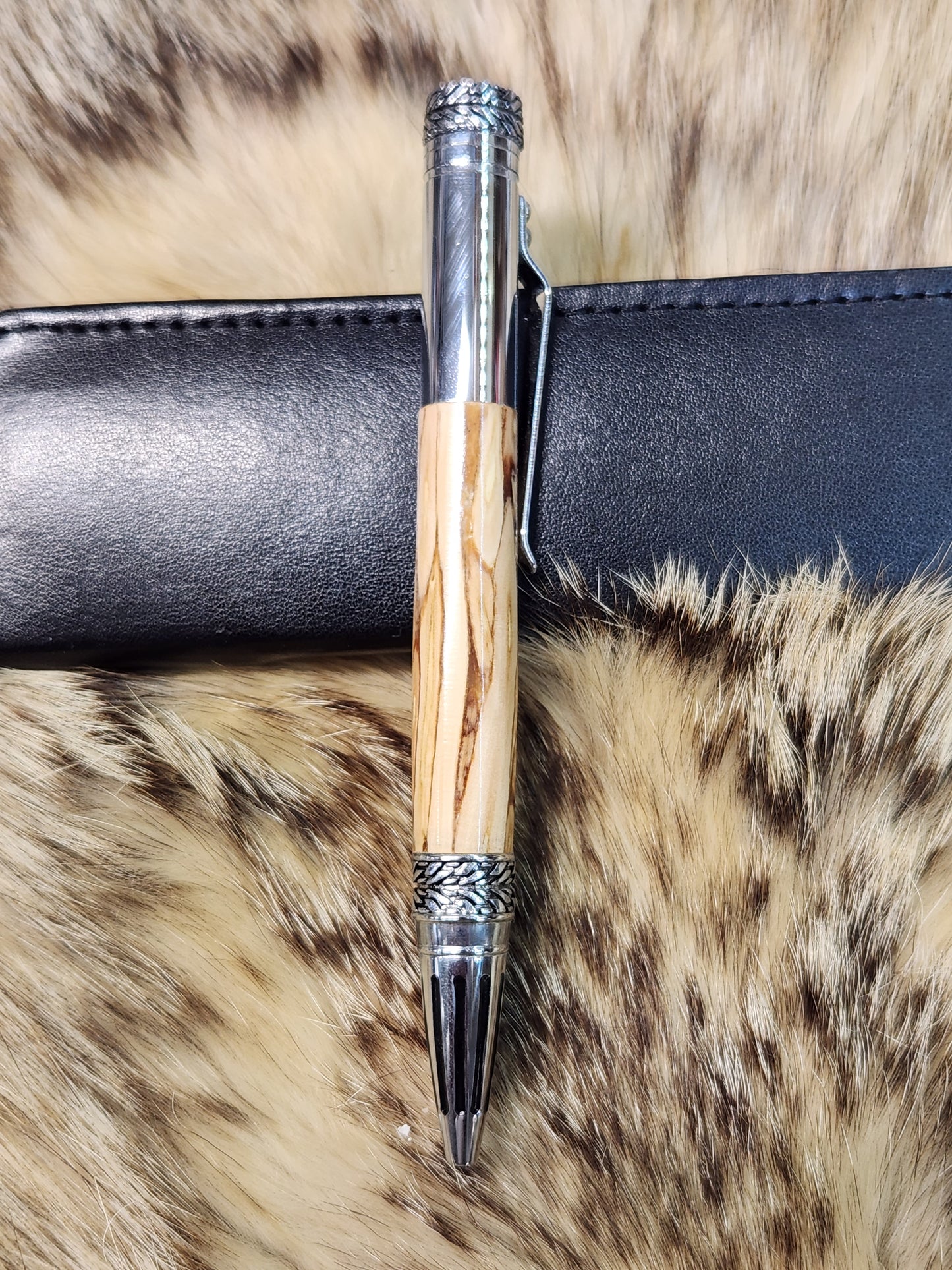 silver gear shift pen made from apple wood