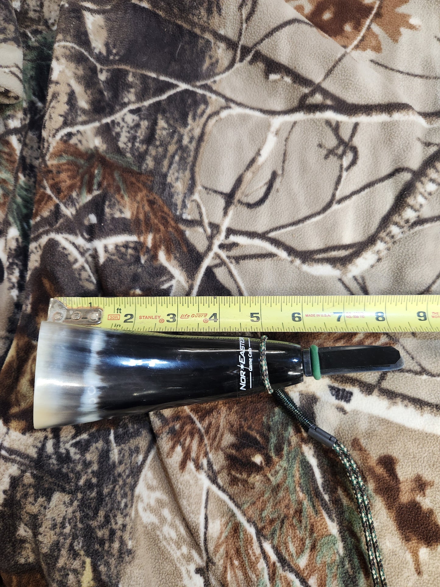 Open reed polished bull horn coyote howler