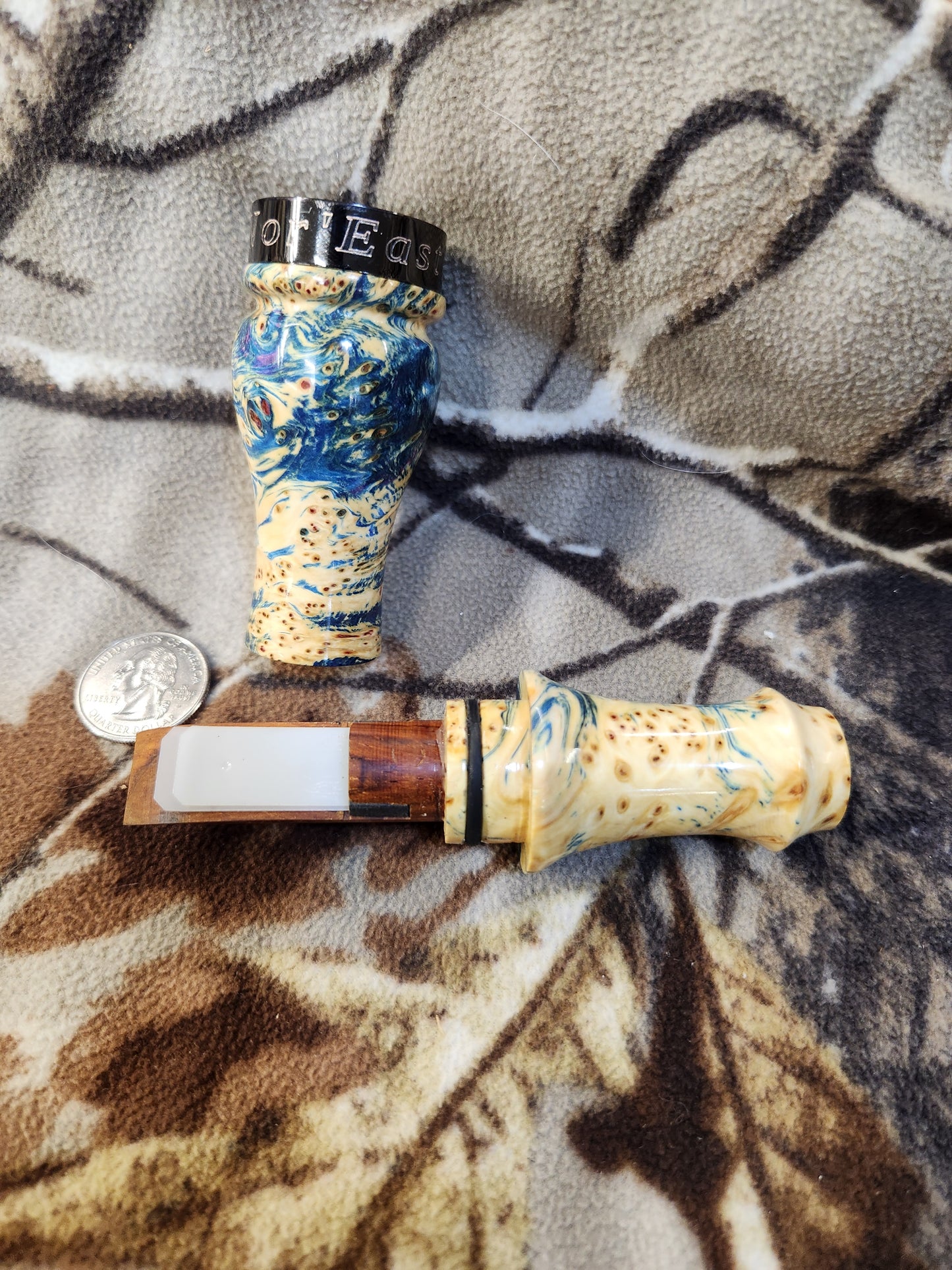 Double reed duck call made from stabilized and dyed yellow cedar burl wood and cocobolo tone board