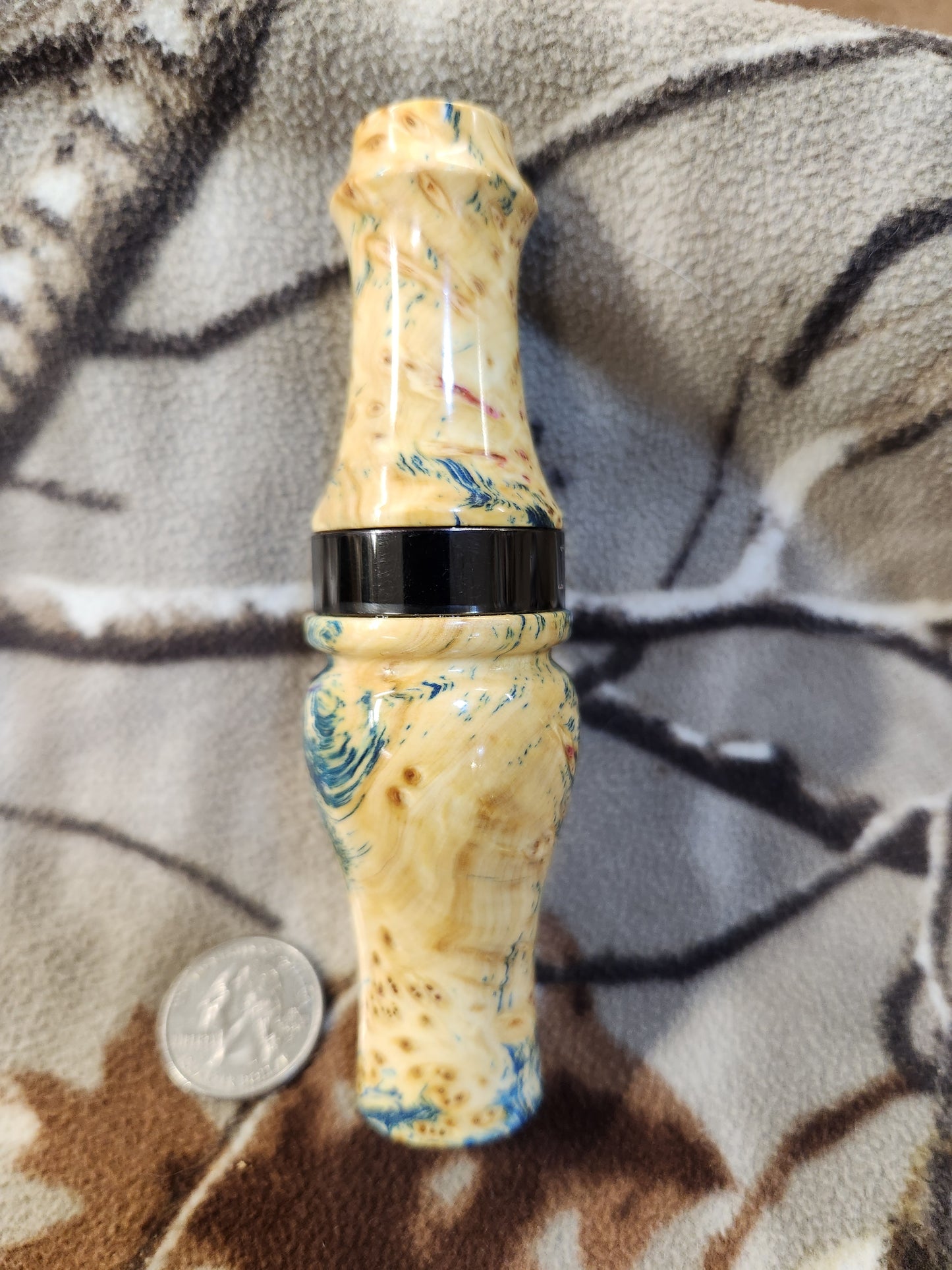 Double reed duck call made from stabilized and dyed yellow cedar burl wood and cocobolo tone board