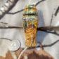 Rabbit distress call made from stabilized and dyed boxelder burl wood