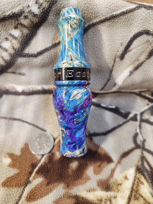 Double reed duck call made from stabilized and dyed boxelder burl wood cocobolo wood tone board