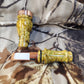 Double reed duck call made from stabilized and dyed amboyna burl wood with cocobolo wood tone board