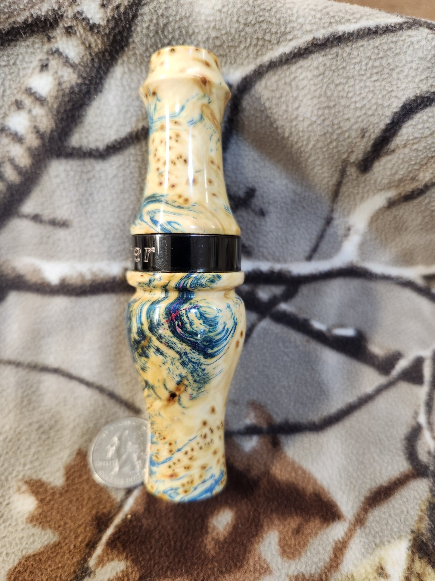 Double reed duck call made from stabilized and dyed yellow cedar burl wood and cocobolo tone board