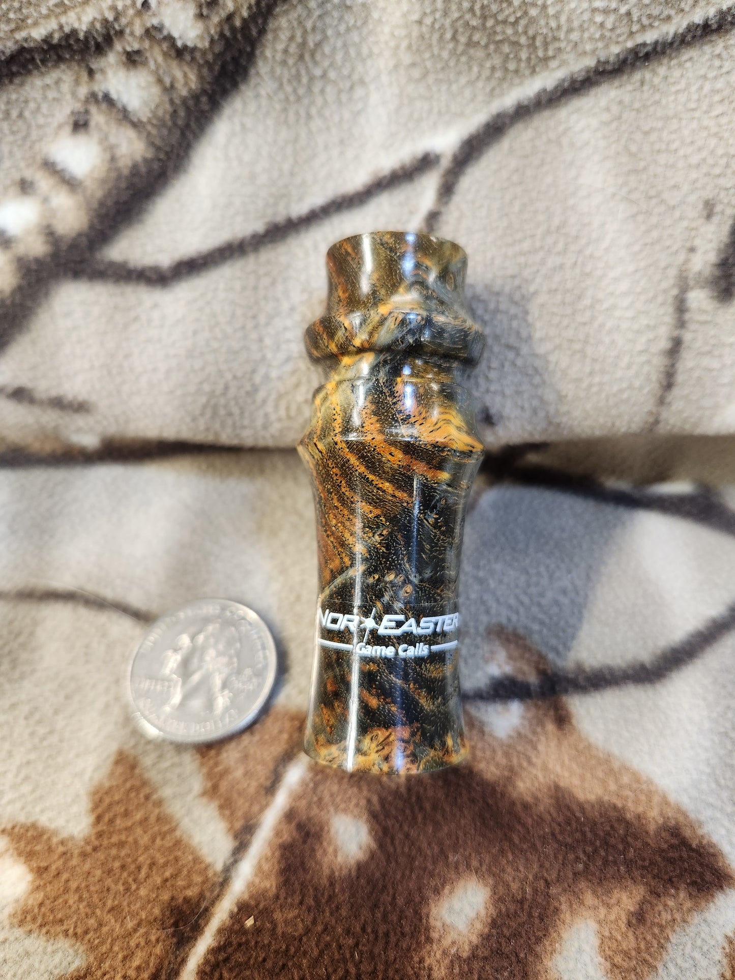 Rabbit distress call made from stabilized and dyed black ash burl