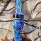 Double reed duck call made from stabilized and dyed boxelder burl wood cocobolo wood tone board