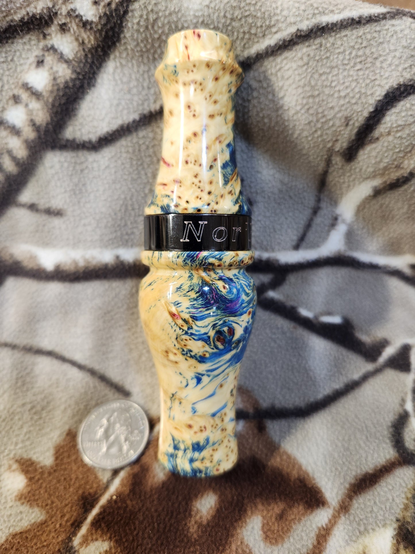 Double reed duck call made from stabilized and dyed yellow cedar burl wood and cocobolo tone board