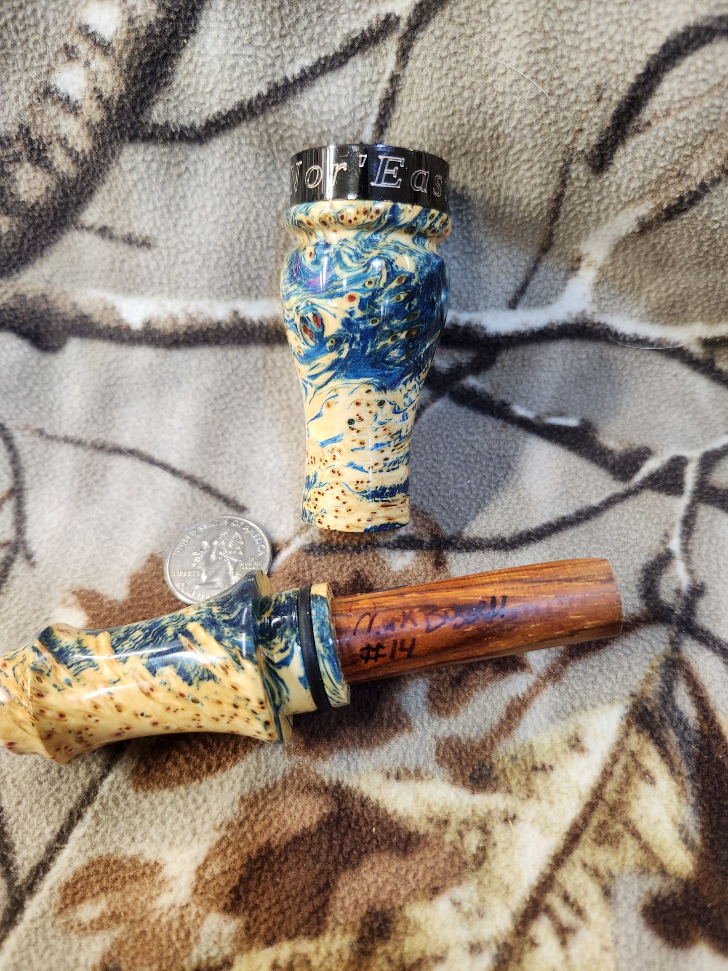 Double reed duck call made from stabilized and dyed yellow cedar burl wood and cocobolo tone board