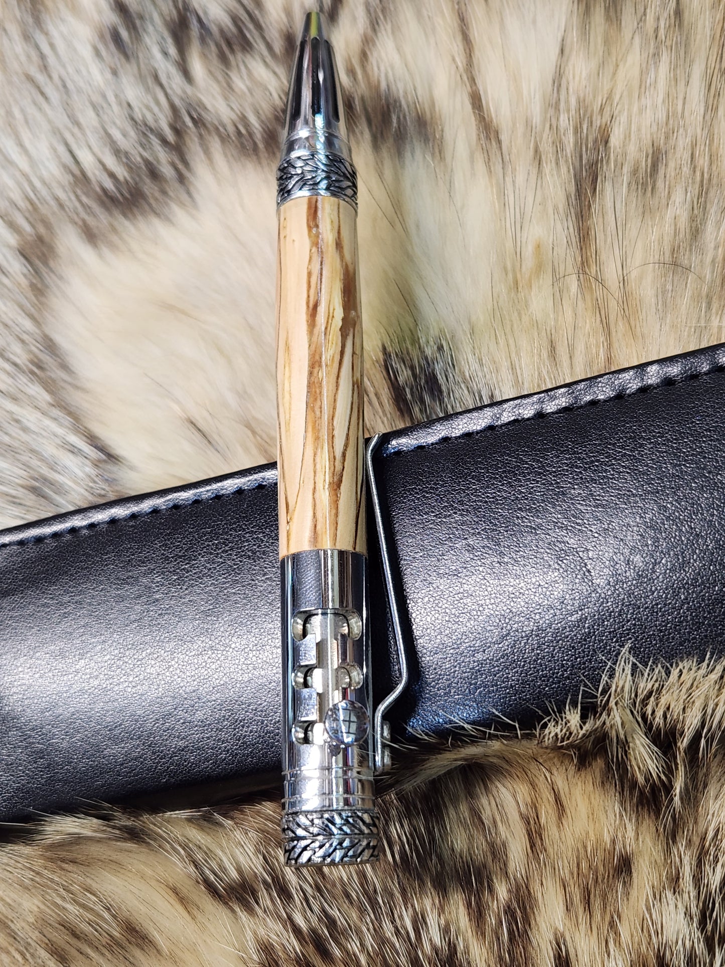 silver gear shift pen made from apple wood