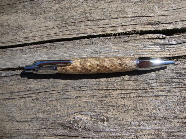 Vortex style pen with real rattle snake skin in resin