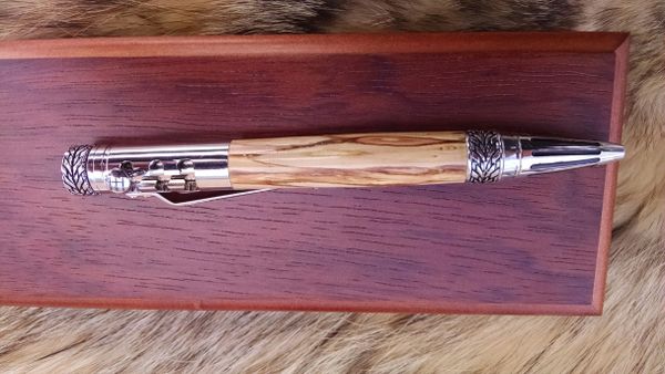 silver gear shift pen made from apple wood